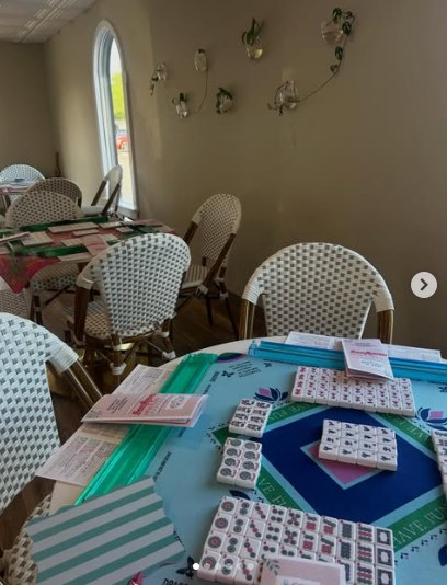 Mahjong tables set up for a community event at Meme’s Cafe