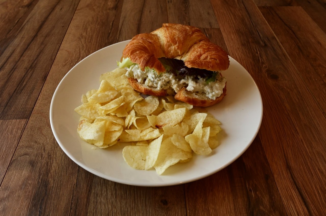 Chicken salad croissant with chips at Meme’s Cafe