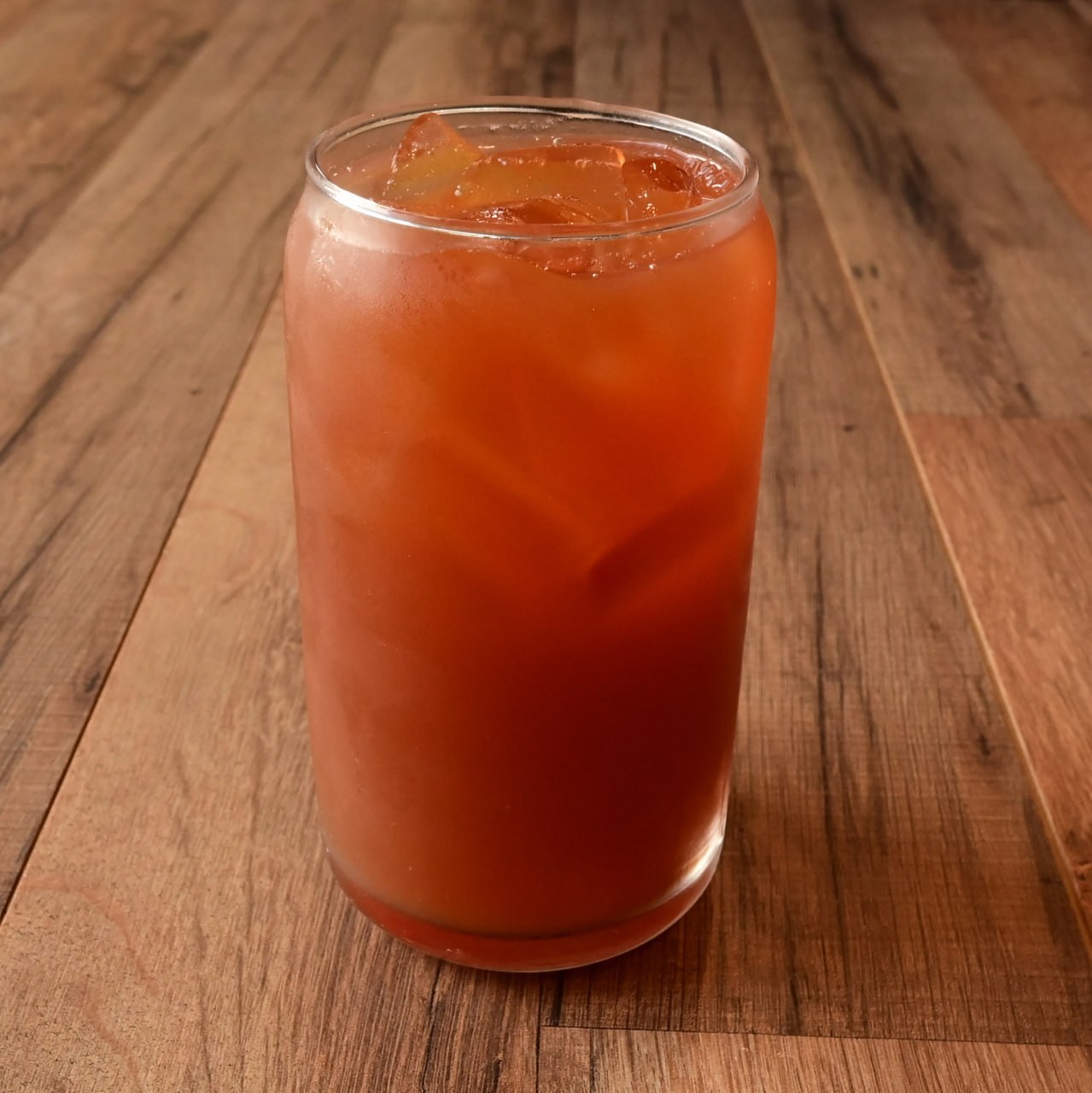 Fresh brewed iced tea drink on a wood table at Meme’s Cafe